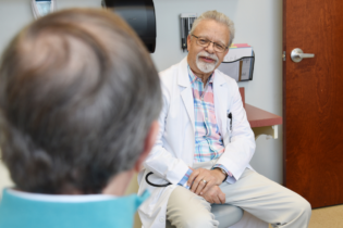 Gaston Medical Partners - Dr. David Locklear speaks with patient